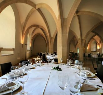 View of a set table in the Knights’ Hall, Urach Palace